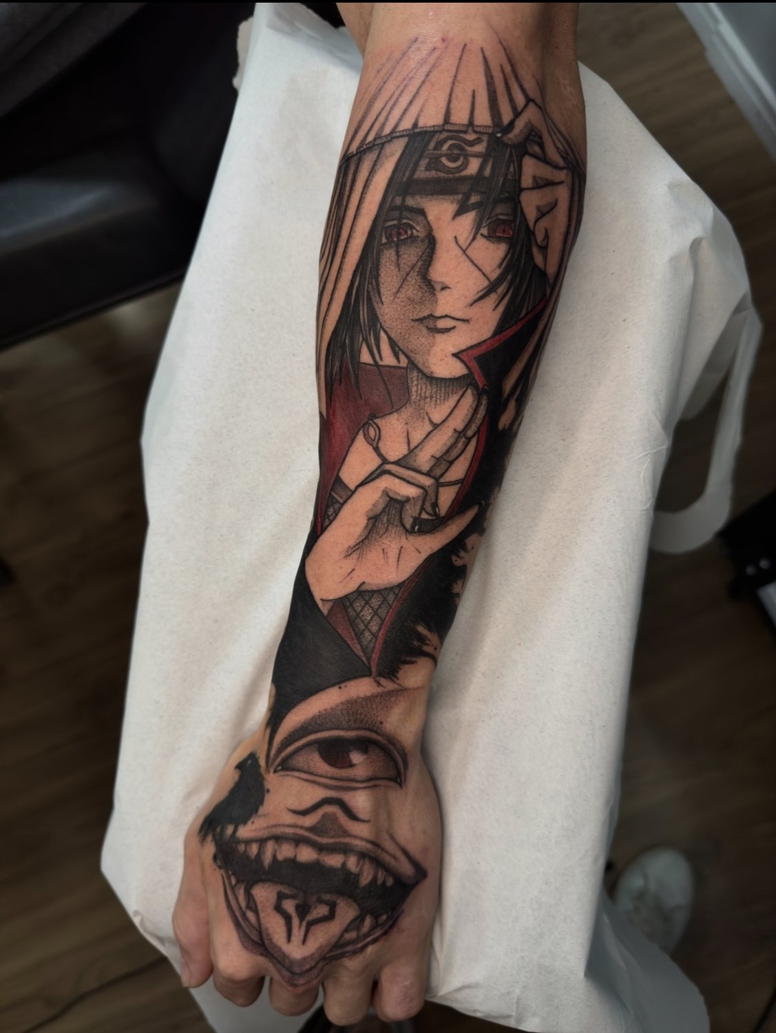 Itachi e Sukuna